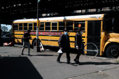 New York closes schools in virus-hit areas over second wave fears 