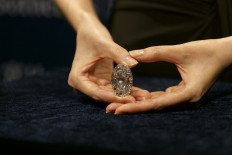 Rare flawless diamond fetches US$15.7 million in Hong Kong auction