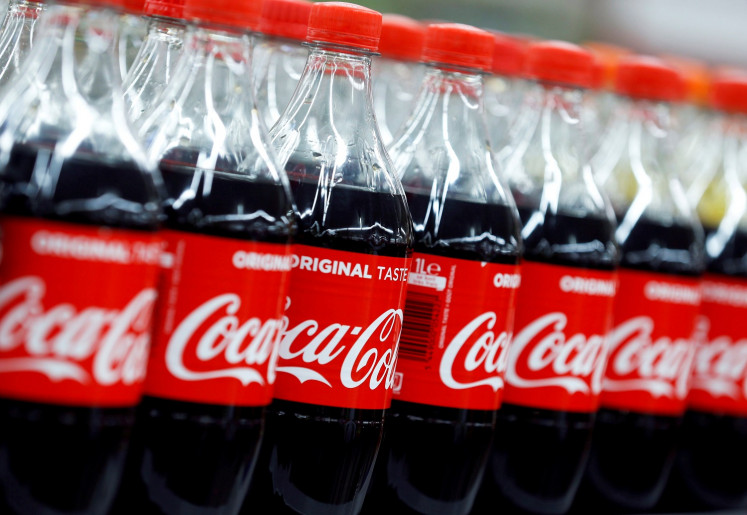 Bottles of Coca-Cola are seen at a Carrefour Hypermarket store in Montreuil, near Paris, France, on February 5, 2018. 
