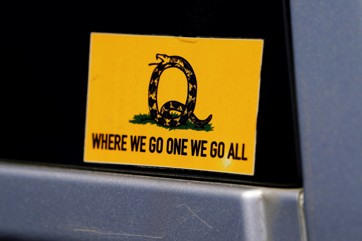 A sticker that references the QAnon slogan is seen on a truck that participated in a caravan convoy in Adairsville, Georgia, United States, on September 5, 2020. 