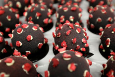 Prague cafe hits sweet spot with coronavirus-shaped dessert