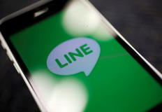 The logo of free messaging app Line is pictured on a smartphone in this photo illustration taken in Tokyo, Japan, on September 23, 2014. 