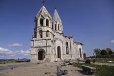 This picture taken on October 8, 2020 shows the damaged Ghazanchetsots (Holy Savior) Cathedral in the historic city of Shusha, some 15 kilometers from the disputed Nagorno-Karabakh province's capital Stepanakert, after it was hit by a bomb as fighting between Armenian and Azerbaijani forces spilled over today ahead of a first meeting of international mediators in Geneva. 