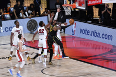 LeBron James #23 of the Los Angeles Lakers shoots the ball against the Miami Heat during Game Five of the NBA Finals on October 9, 2020 in Orlando, Florida at AdventHealth Arena. NOTE TO USER: User expressly acknowledges and agrees that, by downloading and/or using this Photograph, user is consenting to the terms and conditions of the Getty Images License Agreement. Mandatory 