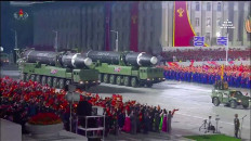 A screen grab taken from a KCNA broadcast on October 10, 2020 shows what appears to be new North Korean intercontinental ballistic missiles during a military parade marking the 75th anniversary of the founding of the Workers' Party of Korea, on Kim Il Sung square in Pyongyang. Nuclear-armed North Korea held a giant military parade, television images showed, with thousands of maskless troops defying the coronavirus threat and Pyongyang expected to put on show its latest and most advanced weapons.