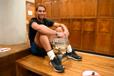 King Nadal continues Paris reign with record-equaling 20th Slam