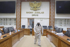 House building in Jakarta on lockdown as dozens test positive for coronavirus