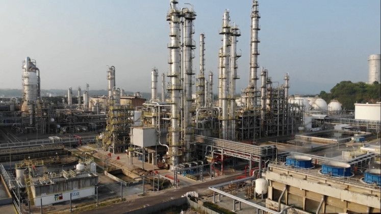 National strategic project: Chimneys stand tall at the newly constructed gas processing plants operated by Chandra Asri in the industrial city of Cilegon in Banten, West Java. The plants produce methyl tert-butyl ether (MTBE) and butene1.