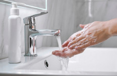 The coronavirus remains active on human skin for nine hours, Japanese researchers have found, in a discovery they said showed the need for frequent hand washing to combat the COVID-19 pandemic.