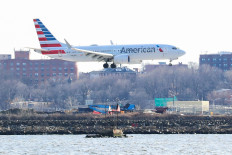 An American Airlines Boeing 737 MAX 8, on a flight from Miami to New York City, comes in for landing at LaGuardia Airport in New York, US, on March 12, 2019. 