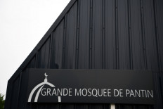 France closes Paris mosque in clampdown over teacher's beheading 