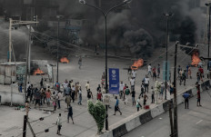 Fires burn in Lagos after Nigerian soldiers shoot anti-police protesters