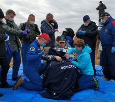 Three-man US-Russian crew returns to Earth from ISS