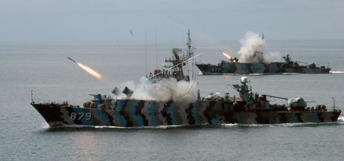Two Parchim-class corvettes KRI Wiratno 879 (foreground) KRI Sutanto 877 are firing RBU-600 antisubmarine rockets (Asroc) simultaneously during an exercise in East Kalimantan on Dec.14, 2007.