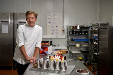 Belgian chocolatier Pierre Marcolini poses in his kitchen workshop after being crowned best pastry chef in the world by his peers at international competition, in Brussels, Belgium, on October 27, 2020. 