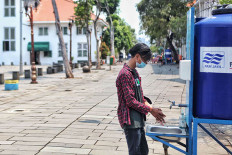 Only 31 percent of people in six big Indonesian cities follow '3M' health protocols: Survey