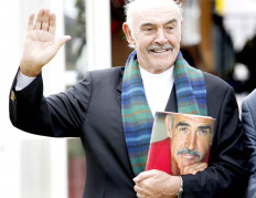 In this file photo taken on August 25, 2008 British actor Sean Connery poses for photographers as he promotes his new book, called 'Being a Scot' at the Edinburgh International Book Festival, in Charlotte Square gardens, in Edinburgh. Legendary British actor Sean Connery, best known for playing fictional spy James Bond in seven films, has died aged 90, his family told the BBC on October 31, 2020. 