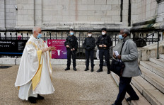 More arrests as French Catholics pray in shadow of attack in Nice 