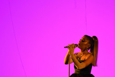 In this file photo taken on January 26, 2020, US singer-songwriter Ariana Grande performs during the 62nd Annual Grammy Awards in Los Angeles.