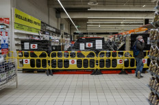 This picture shows the closed bookshop section of an Auchan supermarket in Neuilly-sur-Marne on November 3, 2020. 