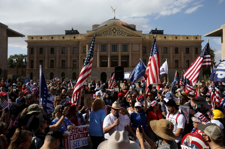 Supporters of US President Donald Trump gather in Arizona to demand poll workers to stop ballot counting process.