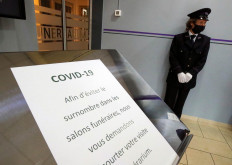 A SOS-DECES mortuary employee attends the funeral of a person who died of the coronavirus disease (COVID-19), in Chapelle-Lez-Herlaimont, Belgium November 10, 2020. 