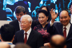 Vietnam ruling Communist Party chief Trong re-elected for third term