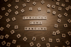 Same-sex duo quits UK's 'Strictly' as one catches COVID-19