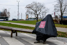 Latvian sculptors cover up statues to protest tax hike