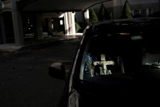 Strict new limits imposed coast to coast in US as COVID-19 surge continues