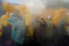 At least 55 hurt in Thailand's most violent protests since new movement emerged