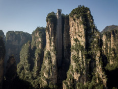 This picture taken on November 13, 2020 shows an aerial view of the Bailong elevators in Zhangjiajie, China's Hunan province. 