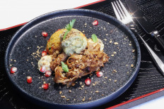 A pea protein-based lamb shawarma with aubergine, yoghurt and couscous, pomegranate, inspired by a dish created by chef Chantelle Nicholson is seen at flavor maker Givaudan's innovation centre in Kemptthal, Switzerland, on October 29, 2020. 