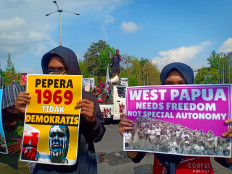 The Papuan Student Alliance commemorates what they consider West Papua Liberation Day in Yogyakarta on Dec. 1, 2019. The protesters rejected Papua's special autonomy arrangement with Jakarta and demanded a referendum to determine their own future.