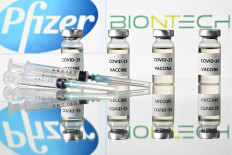 Pfizer seeks EU vaccine approval as OECD sees recovery in 2021 