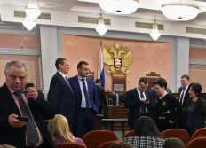 Russia carries out mass raids on Jehovah's Witnesses, makes arrests
