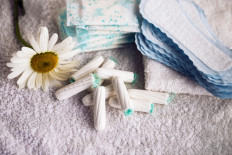 Schoolgirls urge world to follow Scotland on free period products