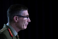 Australia to discharge 13 soldiers after Afghan war crimes probe 