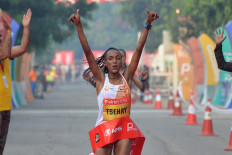 Doctors warn over Delhi's 'suicidal' half-marathon 