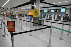 An almost empty check-in area is seen at Gatwick Airport, amid the coronavirus disease (COVID-19) outbreak, in Crawley, Britain, November 27, 2020.  