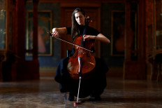 French-Belgian cellist Camille Thomas plays at the Musee des Arts Decoratifs, which is closed to visitors during the lockdown due to the spread of the coronavirus disease (COVID-19), in Paris, France, on November 26, 2020.