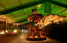 People visit with their cars a drive in Christmas market in Landshut, southern Germany, on November 26, 2020. 