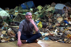 Viral trash: French COVID clean-up nets mounds of masks