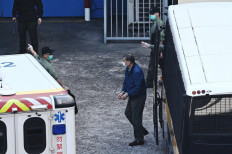 Hong Kong pro-democracy media tycoon denied bail on fraud charge 