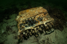A rare Enigma cipher machine used by the Nazi military during World War Two is pictured on the seabed of Gelting Bay near Flensburg, Germany, on November 11, 2020. 