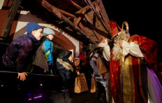Saint Nicholas delivers for Czech kids with drive-through delights