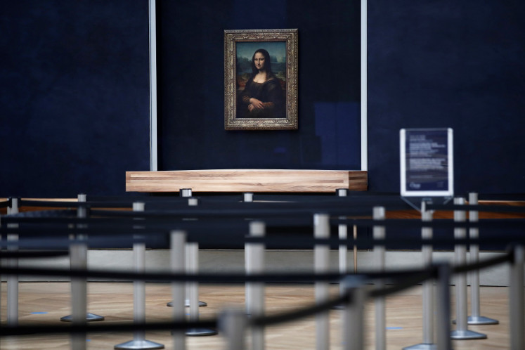 The gallery housing the painting 'Mona Lisa' (La Joconde) by Leonardo da Vinci is seen empty of visitors at the Louvre museum closed as part of the measures taken by the French government to prevent the spread of the coronavirus disease (COVID-19) in Paris, France, on December 4, 2020. 
