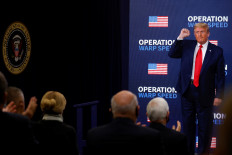 Trump signs pandemic aid and spending bill, averting government shutdown