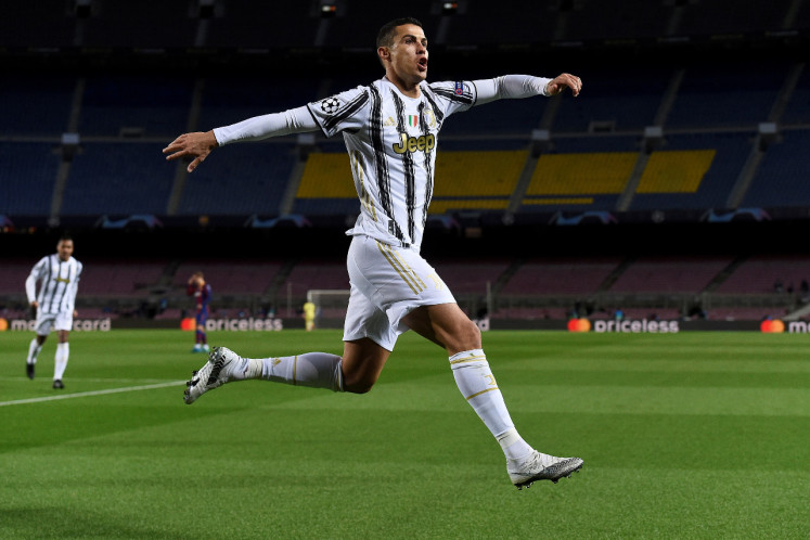 Ronaldo tops Messi with 2 goals in Juve's 3-0 win at Barca