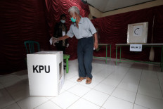 Government urged to improve COVID-19 testing after regional polls